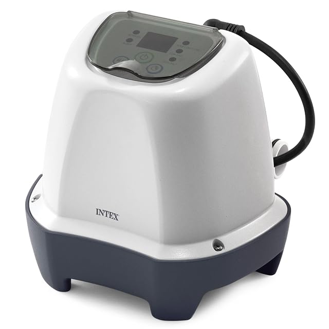 White Intex Krystal Clear salt chlorine generator with a keypad display, plumbed into a pool filter line